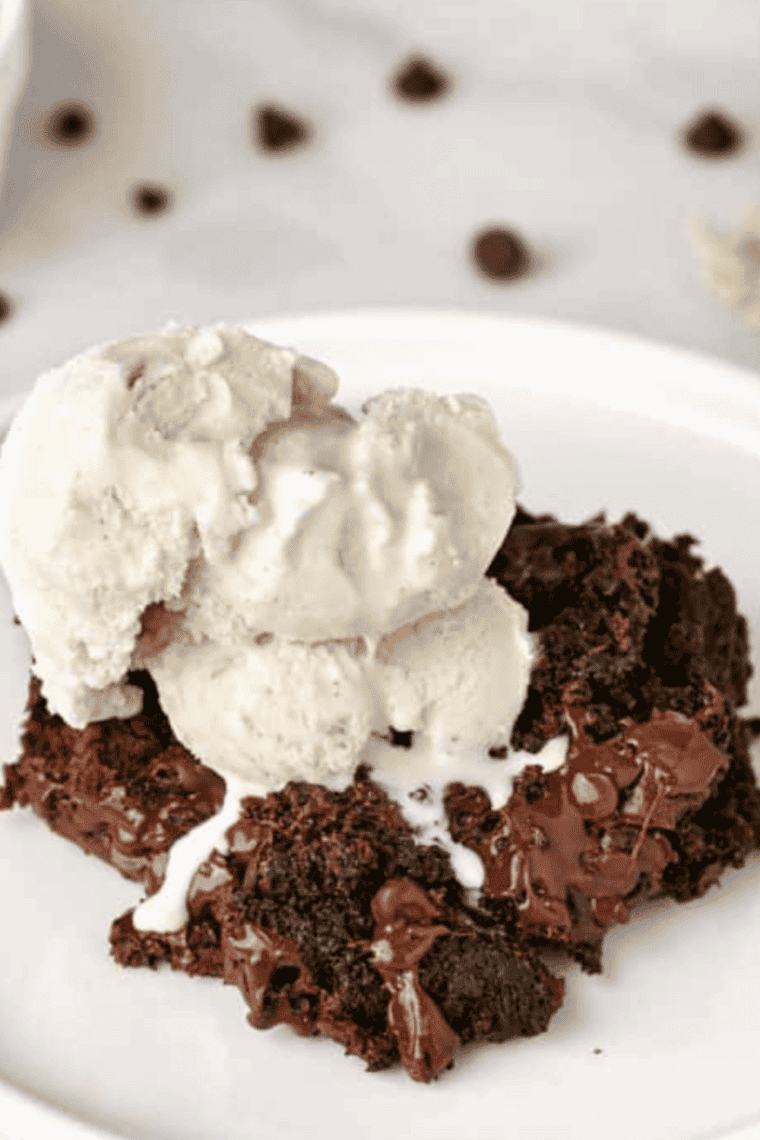 Pouring warm Coca-Cola frosting over hot chocolate sheet cake