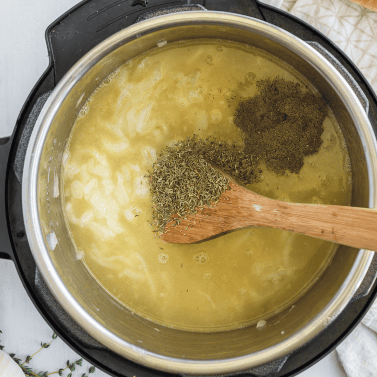 Sherry bubbling with caramelized onions as the pot is scraped