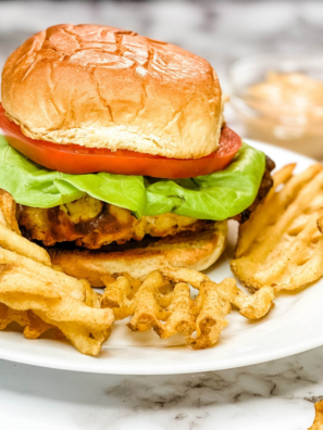 Copycat Buc-ee's chicken sandwich with crispy fried chicken, pickles and sauce on a soft bun
