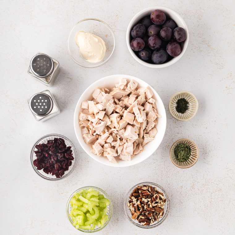 Shredded chicken, minced celery, dried cranberries and slivered almonds for cranberry almond chicken salad