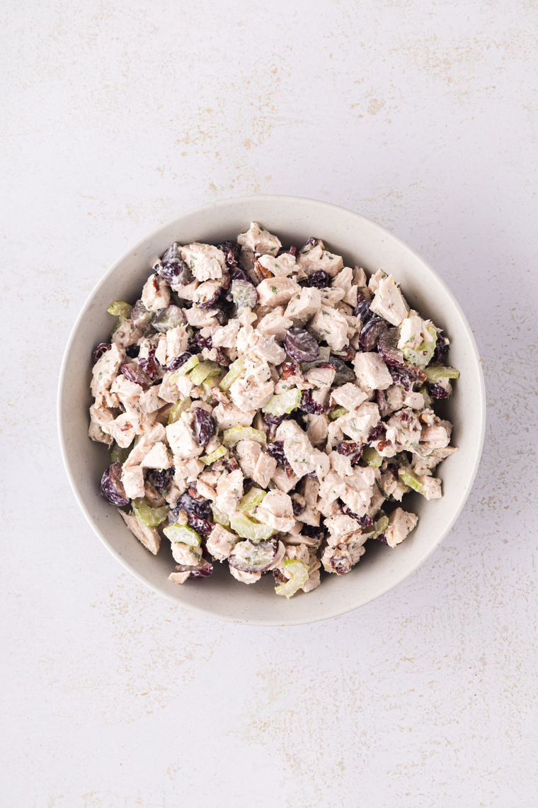 Mayonnaise and seasonings whisked together in a large mixing bowl